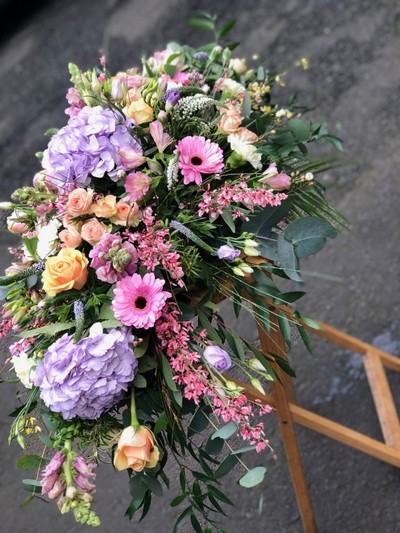 Pastel casket spray 