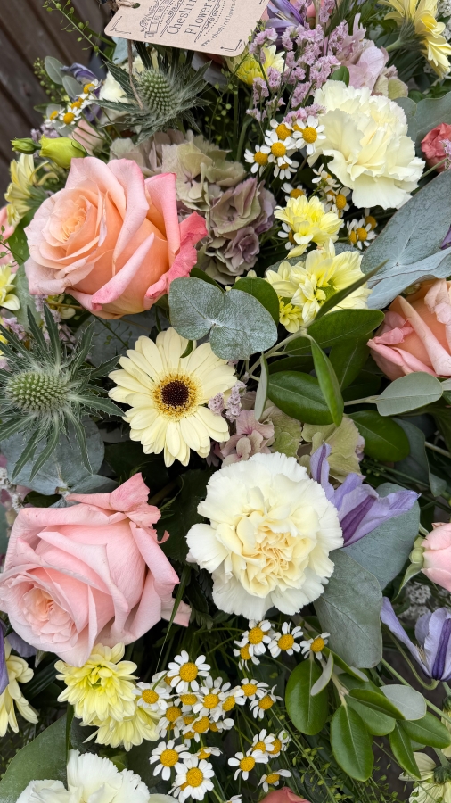 Pastel casket spray 
