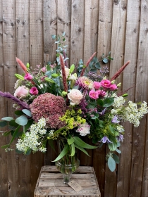 FLOWERS IN GLASS VASES